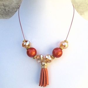 Paprika Orange and Gold Tassel Pendant Necklace